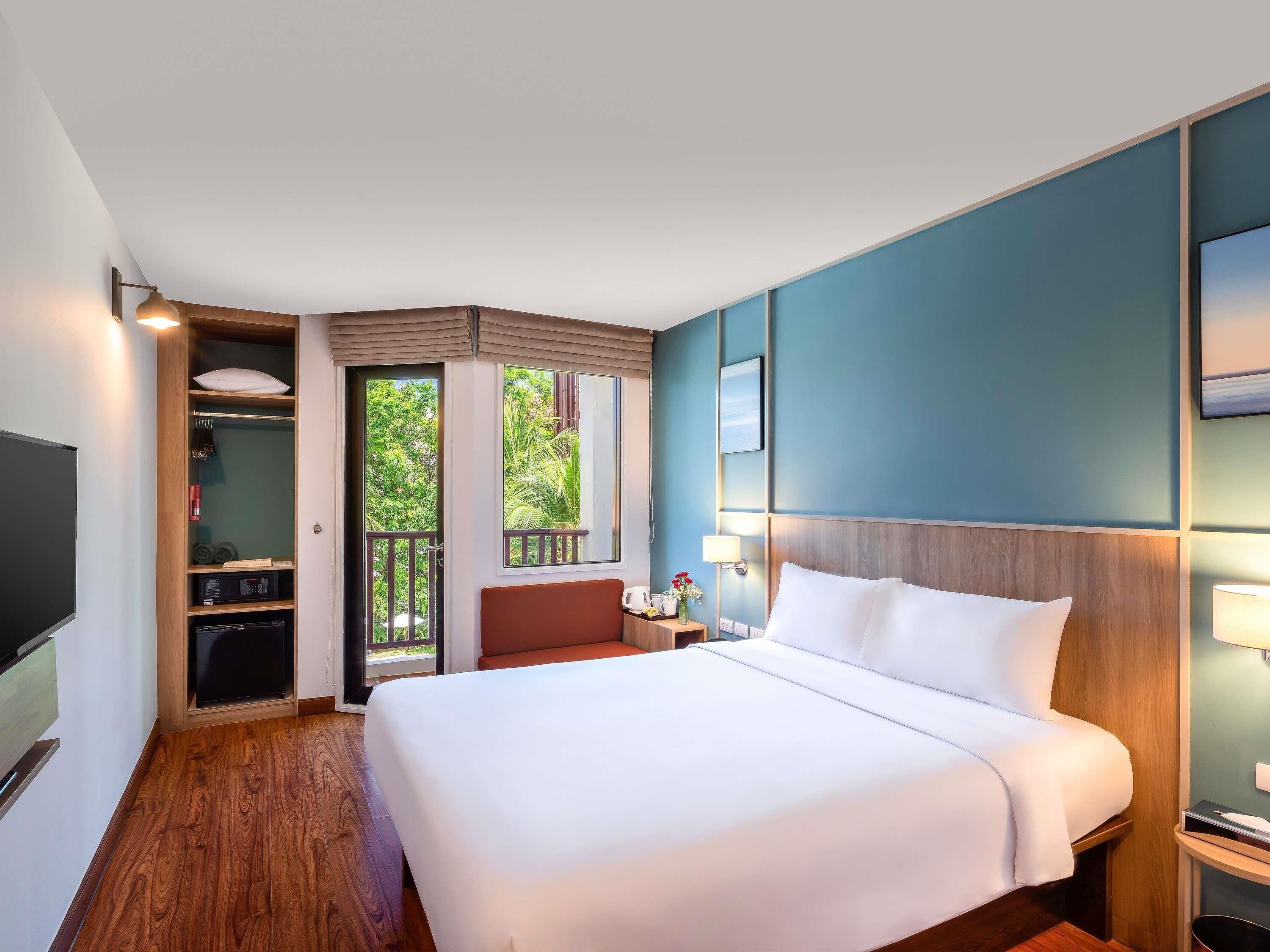 Superior kamer, 1 queensize bed | Een kluis op de kamer, verduisterende gordijnen
