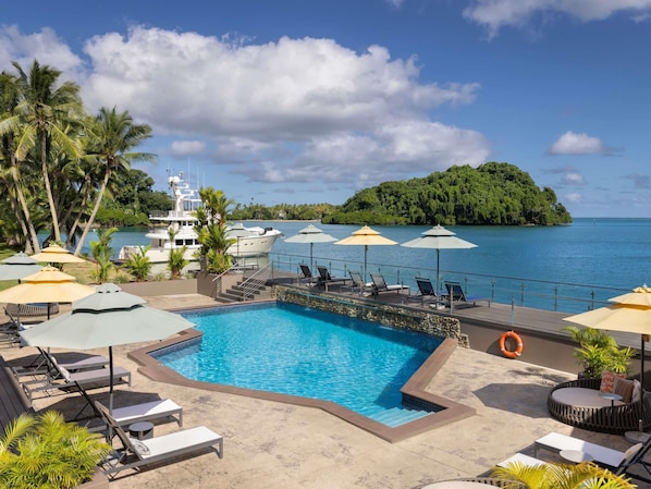 Outdoor pool, pool umbrellas, sun loungers