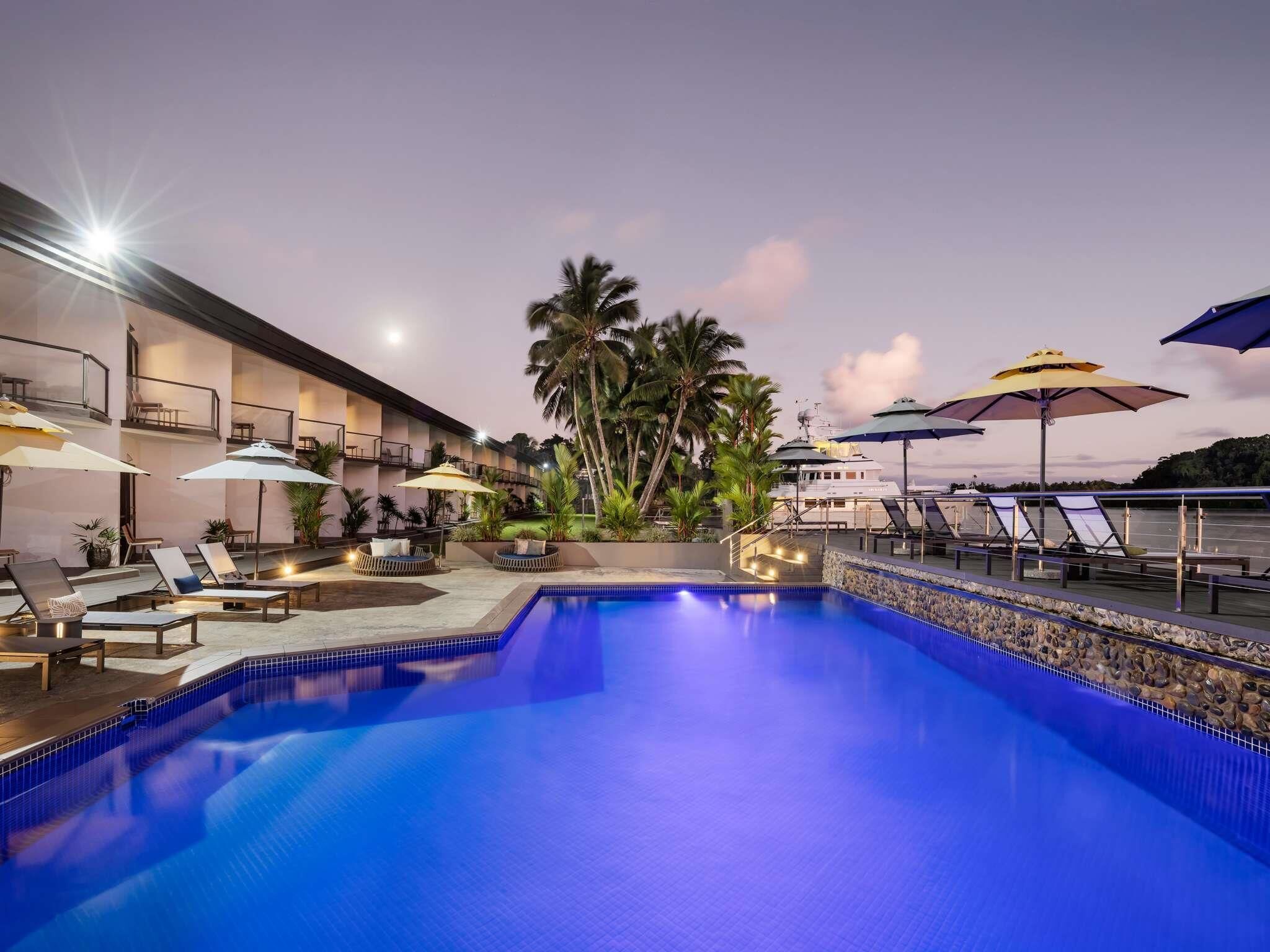 Outdoor pool, pool umbrellas, sun loungers