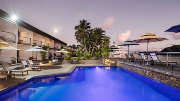 Outdoor pool, pool umbrellas, sun loungers