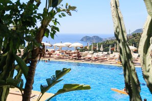 Indoor pool, seasonal outdoor pool, pool umbrellas, sun loungers