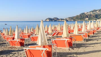 Private beach nearby, sun loungers, beach umbrellas