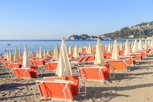 Playa privada en los alrededores, sillas reclinables de playa