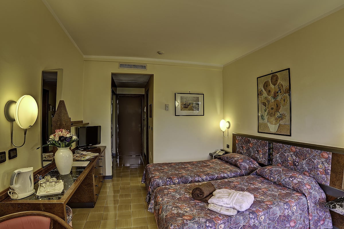 Pillow-top beds, minibar, in-room safe, desk