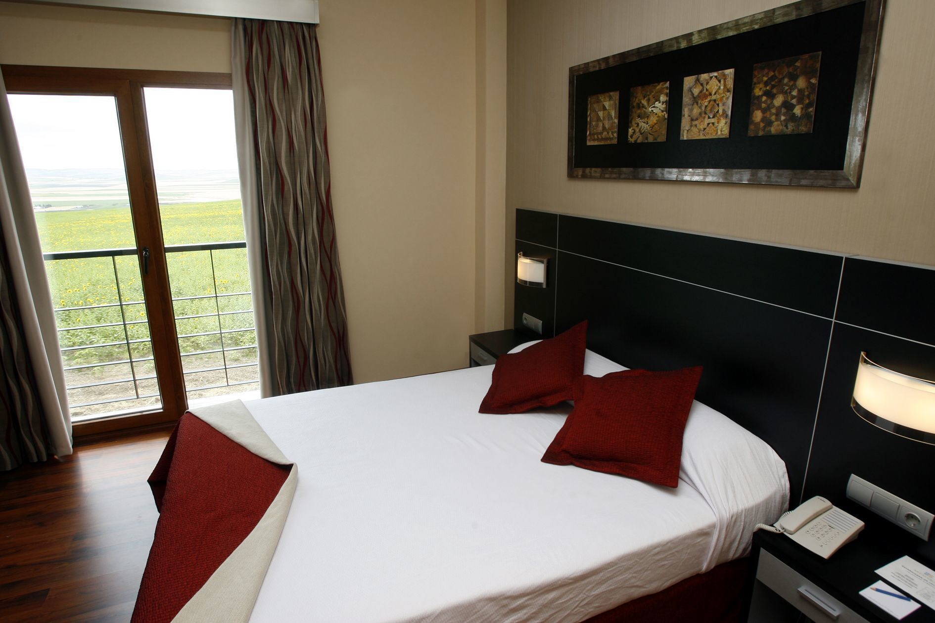 desk, laptop workspace, blackout curtains, cots/infant beds