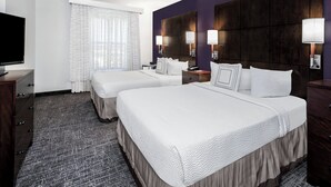A hotel room with two beds, a flat-screen TV, a desk, and a window with curtains. - Residence Inn by Marriott San Antonio SeaWorld/Lackland (San Antonio)