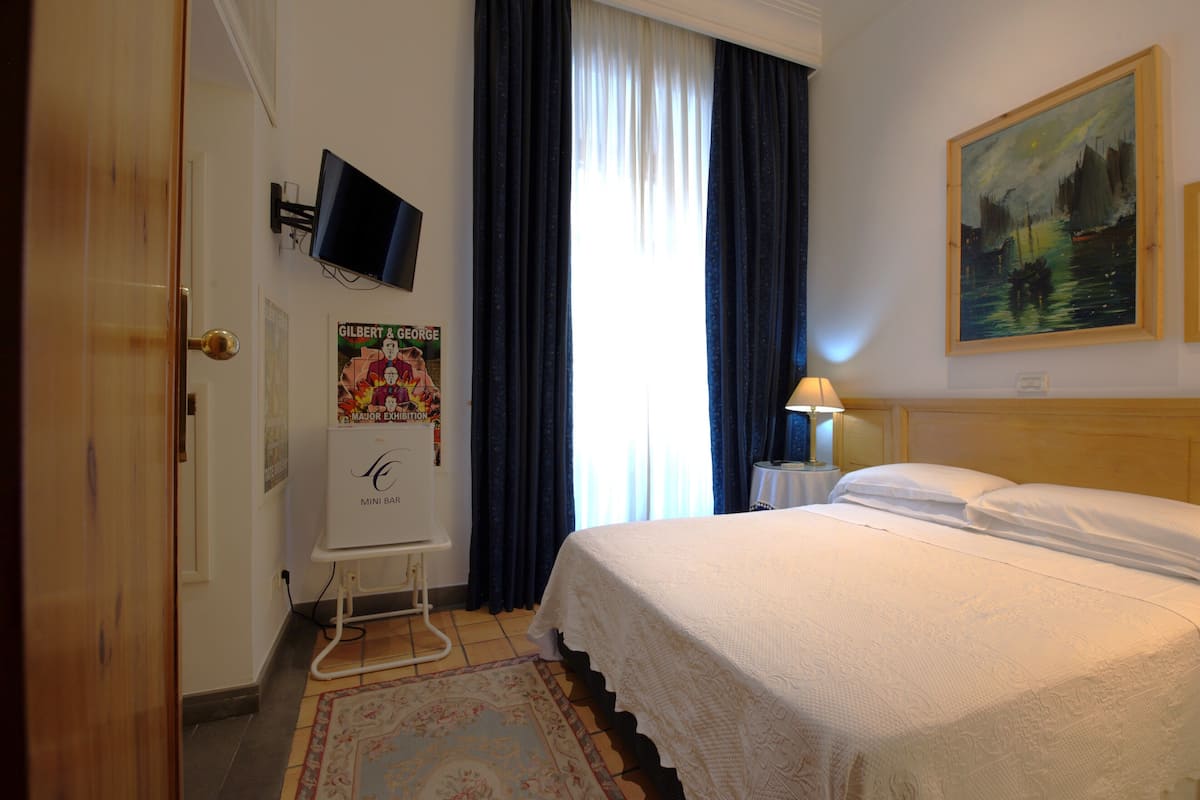 Small Double Room Street View | Minibar, in-room safe, desk, soundproofing