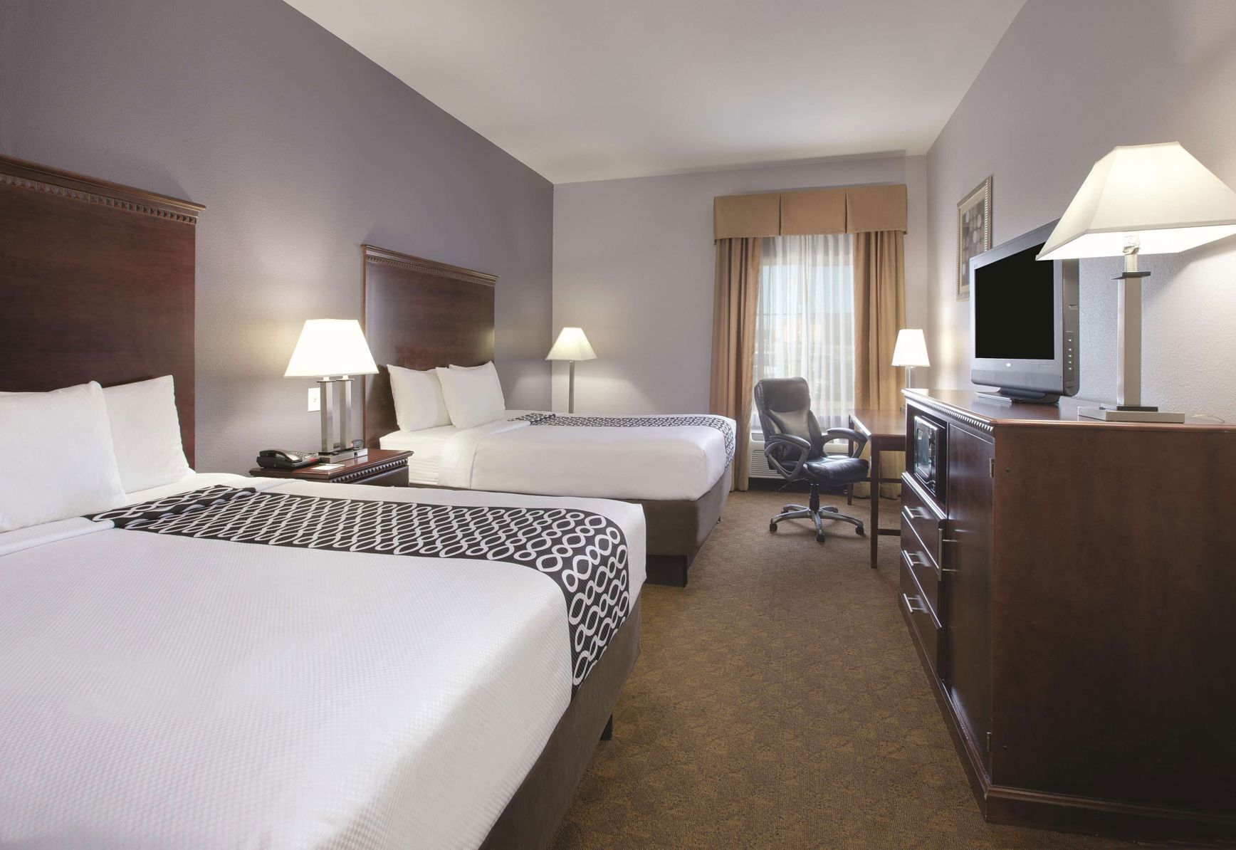 Premium bedding, pillow-top beds, desk, iron/ironing board
