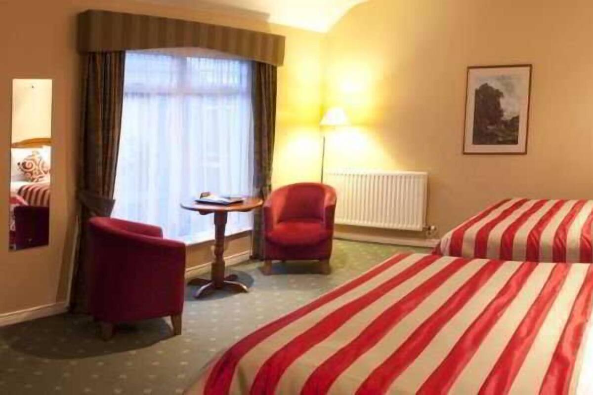 Desk, blackout drapes, iron/ironing board (on request), WiFi (free)