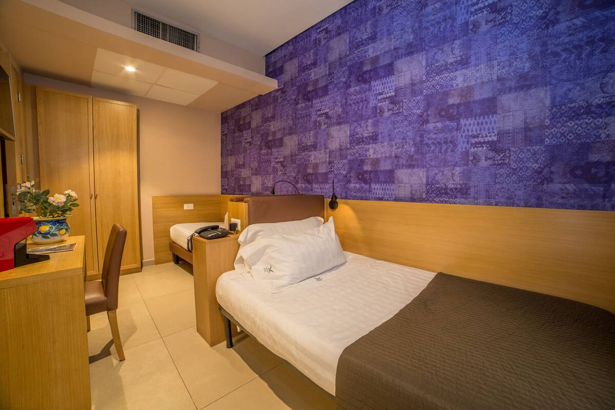 Economy Room, 2 Twin Beds | Premium bedding, in-room safe, desk, blackout drapes