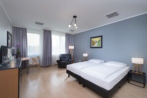 Studio | Hypo-allergenic bedding, down comforters, in-room safe, desk