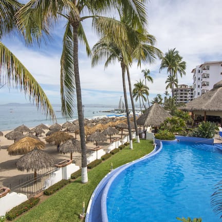 On the beach, sun loungers, beach umbrellas, beach towels