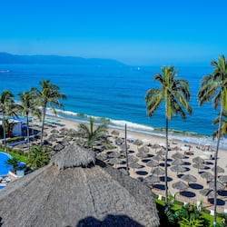 On the beach, sun loungers, beach umbrellas, beach towels