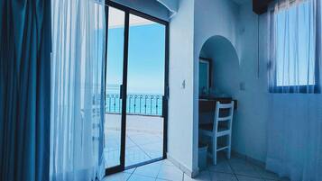 Habitación superior | Caja de seguridad en la habitación, wifi gratis y ropa de cama