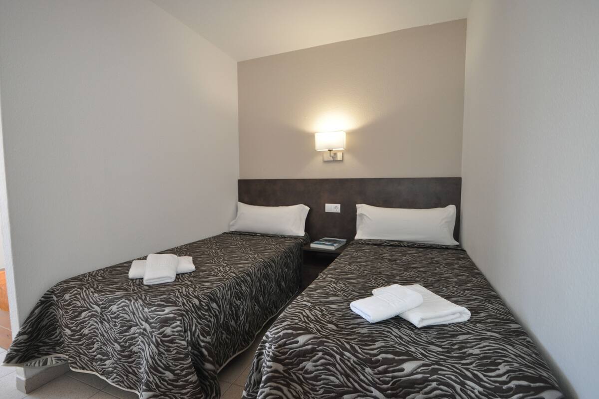 In-room safe, WiFi (free), bed sheets