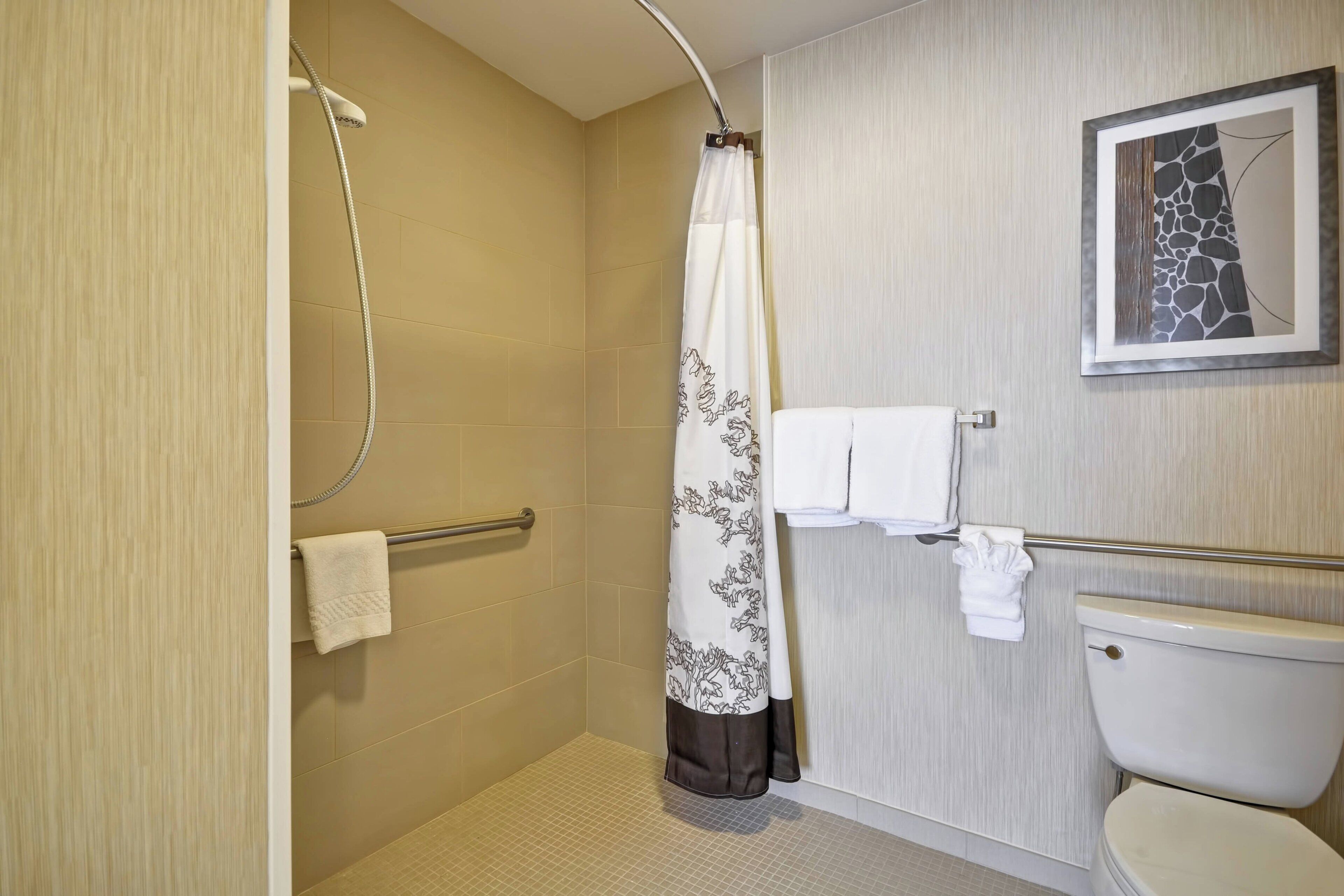 combined shower/bathtub, free toiletries, hair dryer, towels