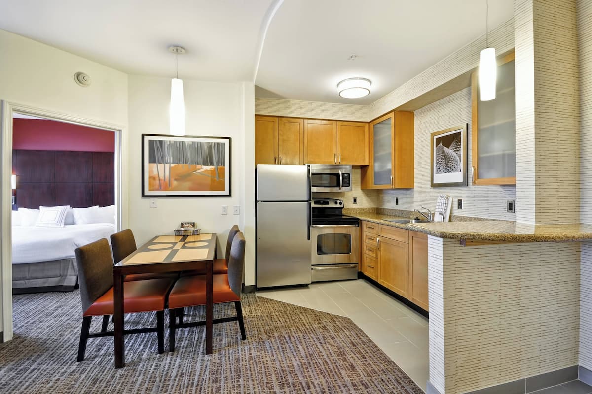 desk, laptop workspace, blackout curtains, iron/ironing board