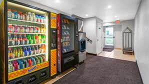 A vending area with various drink options and a water dispenser. - Motel 6 Idaho Falls, ID - Snake River (Idaho Falls)