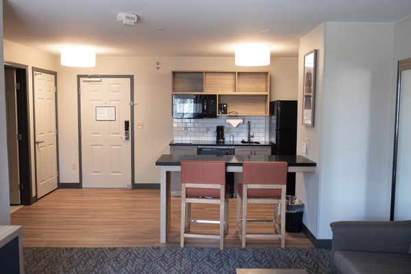 In-room safe, desk, iron/ironing board, cribs (free)