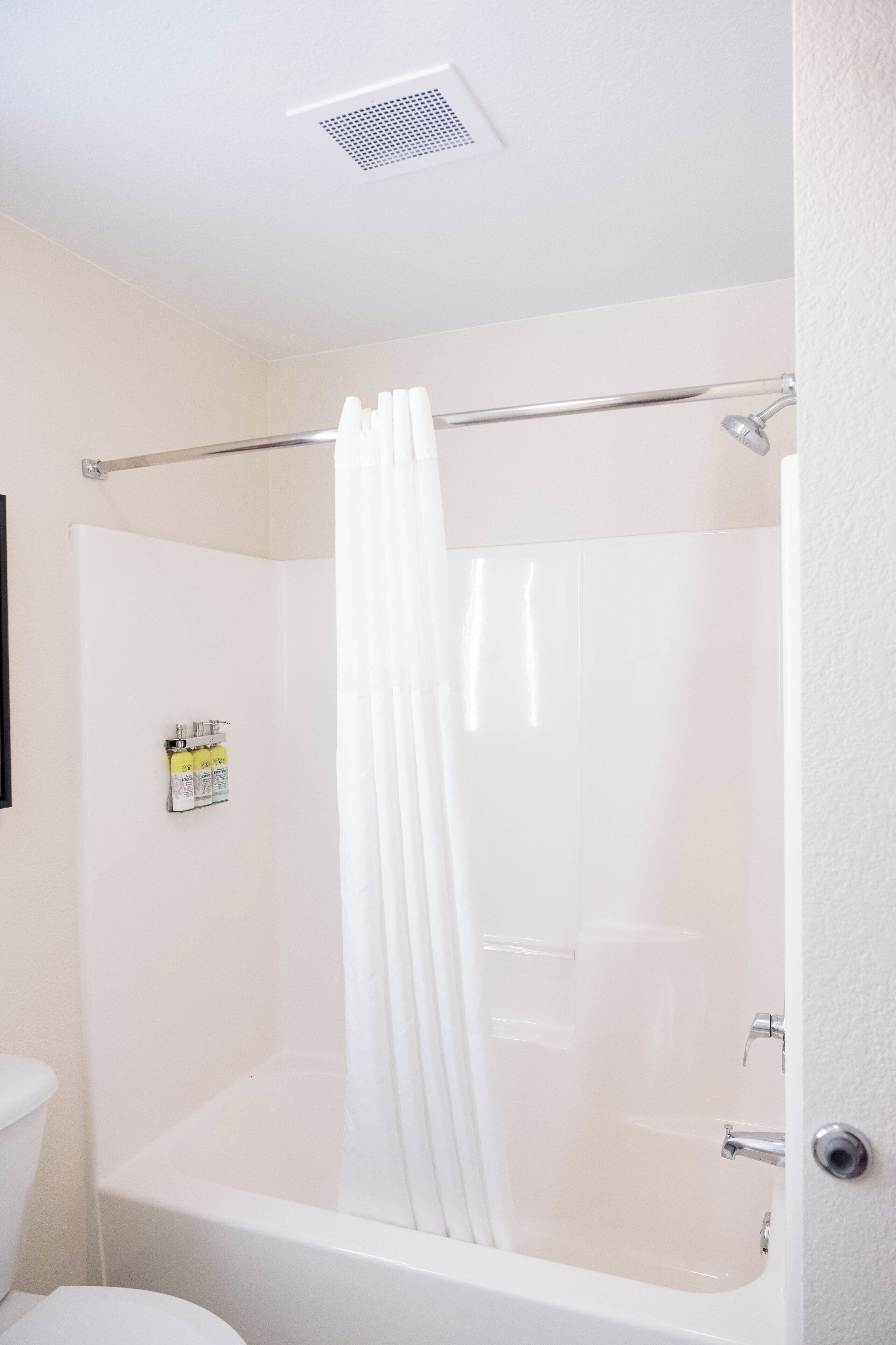 combined shower/bathtub, free toiletries, hair dryer, towels