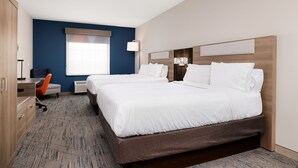 A hotel room with two beds, a desk, a chair, and a large window. - Holiday Inn Express & Suites Kingsville by IHG (Kingsville)