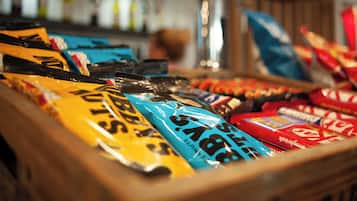 A variety of chocolate bars in a display case.