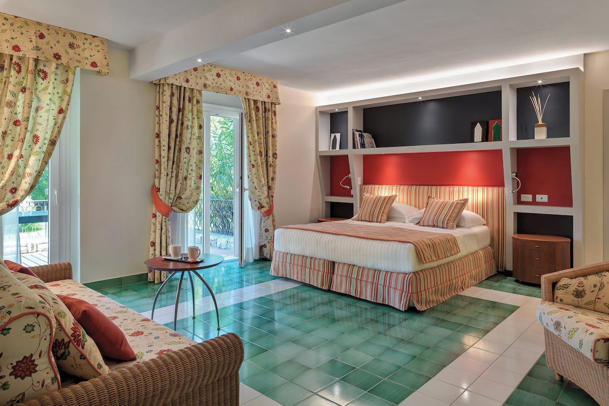 Garden Suite | Minibar, brankas, meja kerja, dan kedap suara