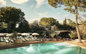 Seasonal outdoor pool, pool umbrellas, sun loungers