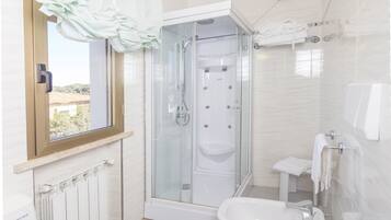 Shower, free toiletries, hair dryer, bathrobes