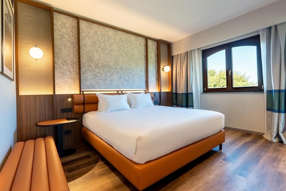 Suite, 1 slaapkamer | 1 slaapkamer, luxe beddengoed, een minibar, een kluis op de kamer