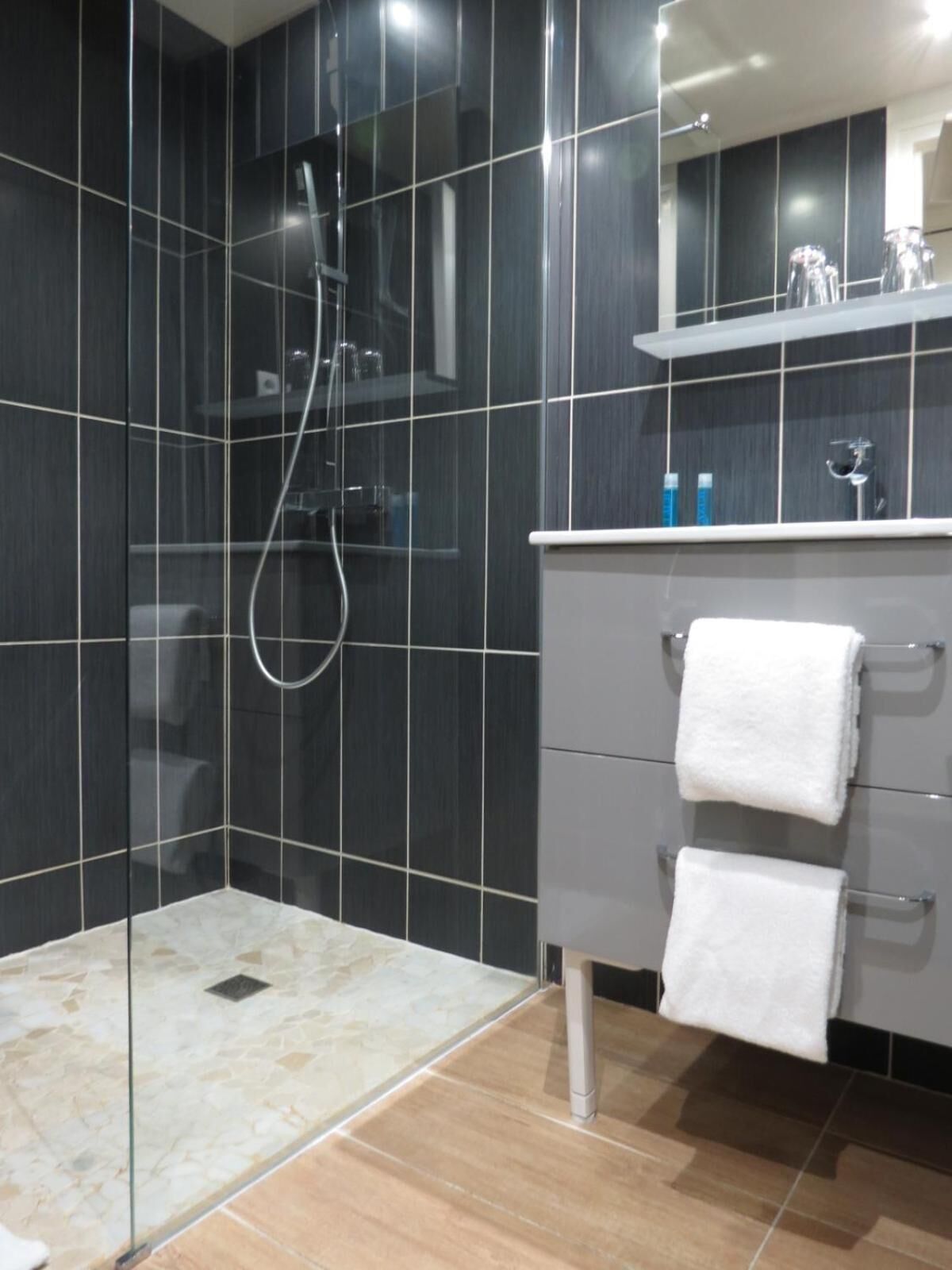 deep-soaking bathtub, free toiletries, hair dryer, towels