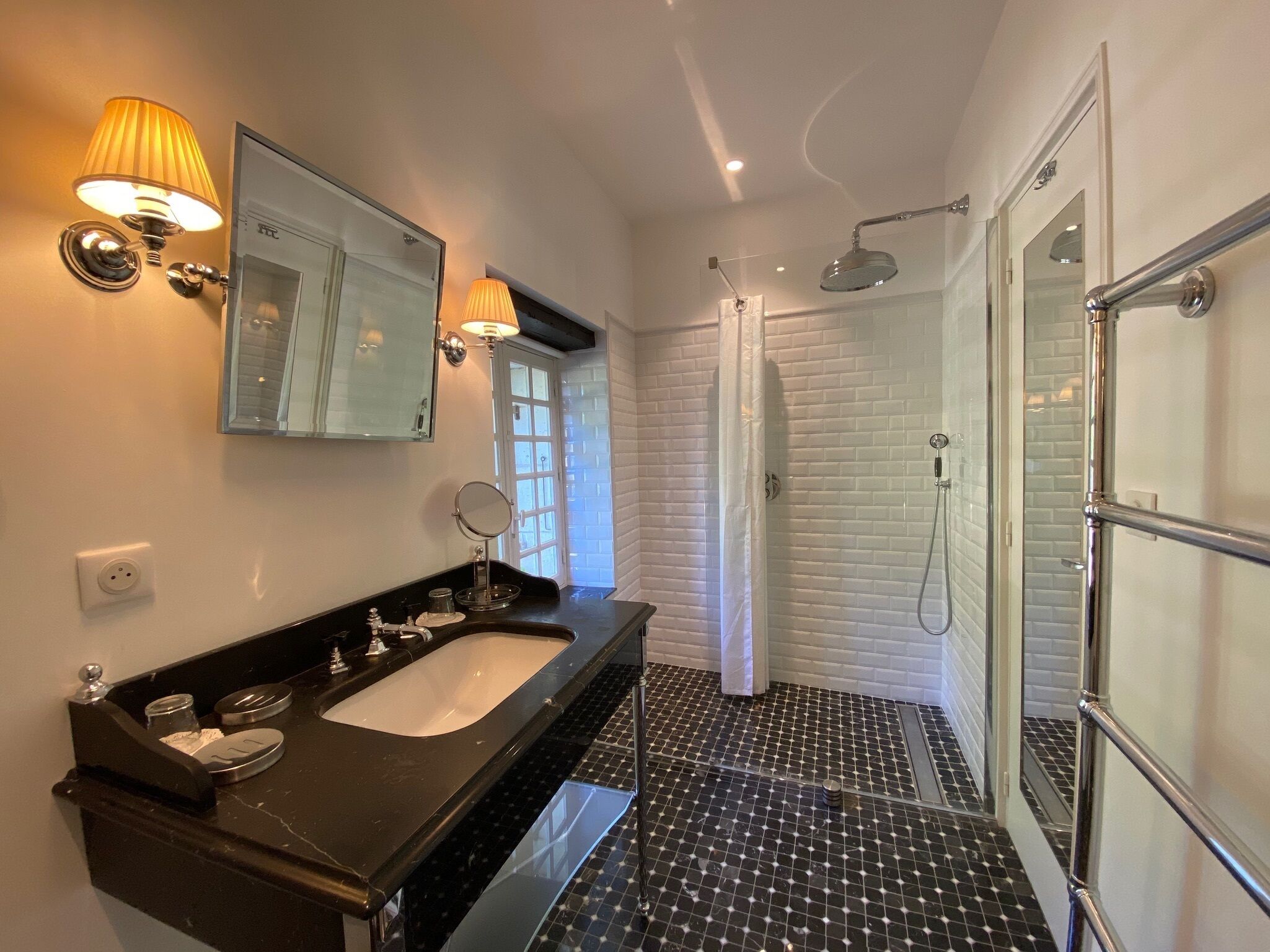 designer toiletries, hair dryer, bathrobes, towels