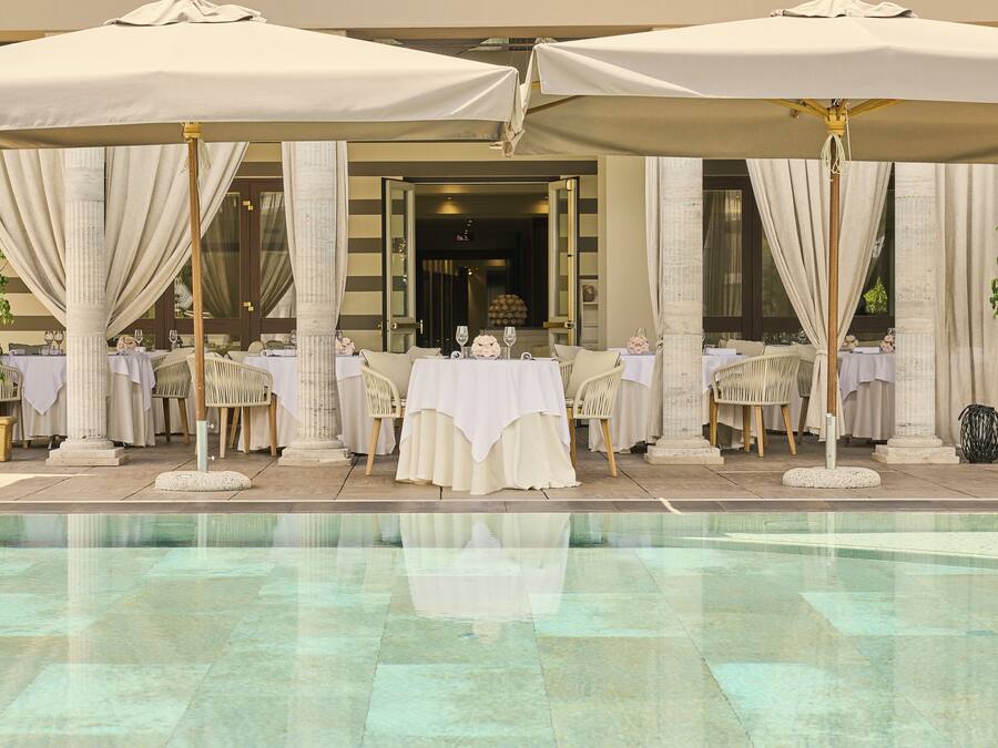 Indoor pool, outdoor pool, pool umbrellas, sun loungers