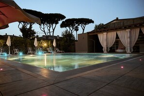 Indoor pool, outdoor pool, pool umbrellas, pool loungers