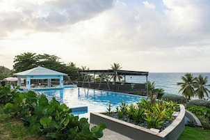 Outdoor pool, open 7:00 AM to 10:00 PM, pool umbrellas, sun loungers