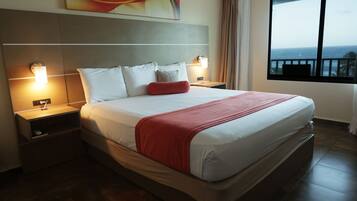 Standard Single Room, 1 King Bed, Ocean View | In-room safe, desk, bed sheets