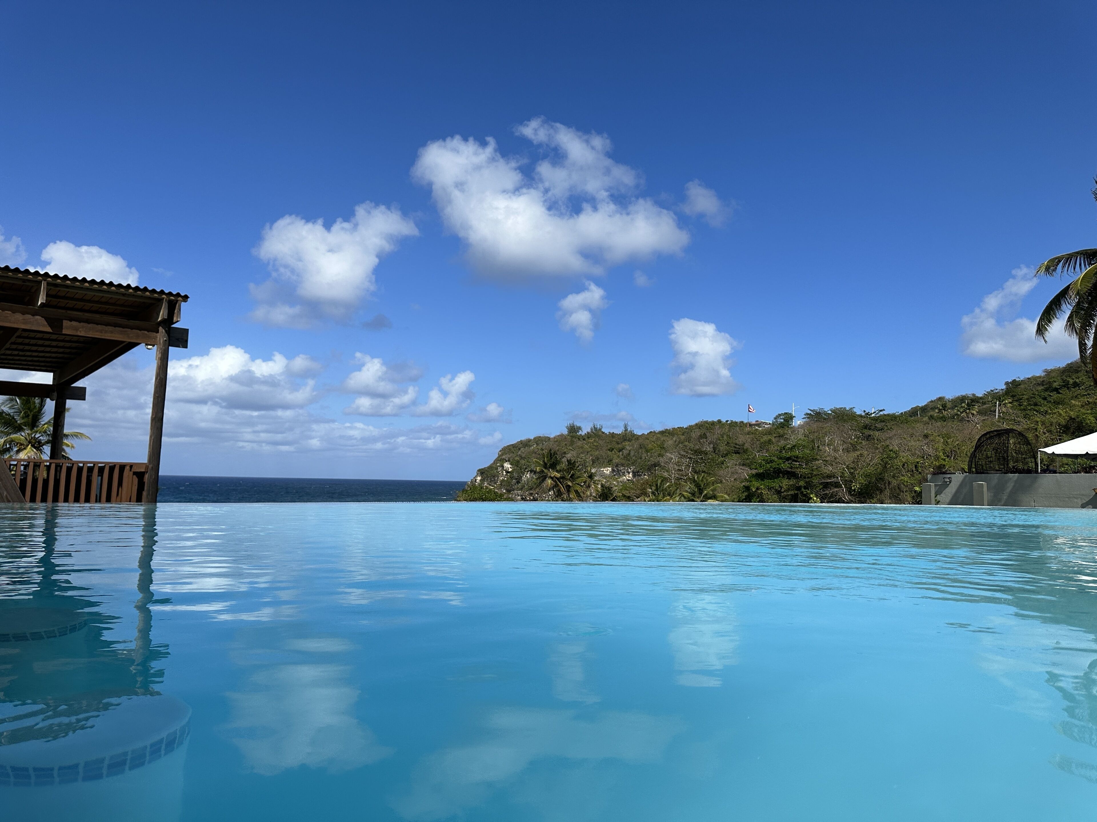 Outdoor pool, open 7:00 AM to 10:00 PM, pool umbrellas, pool loungers