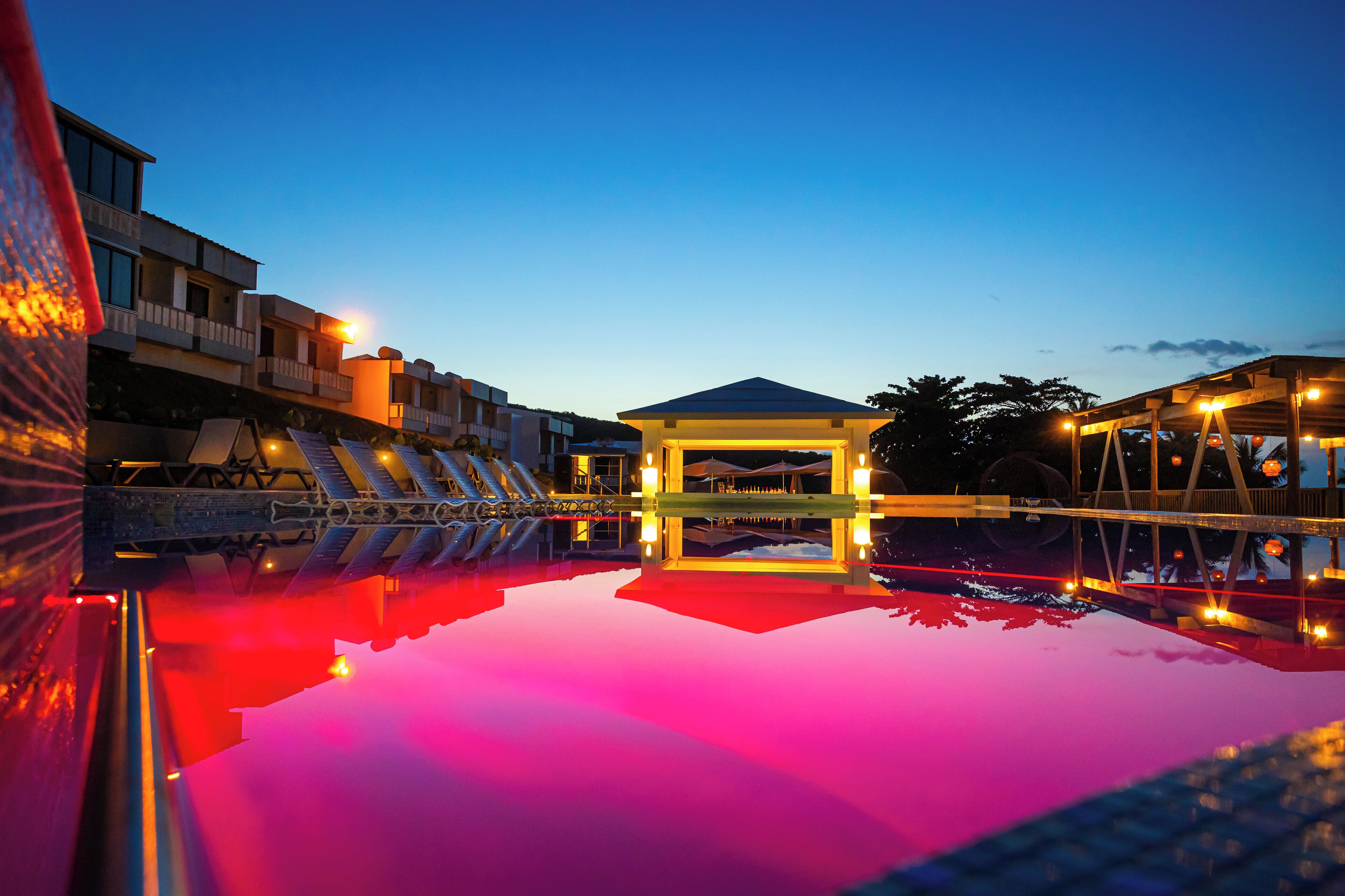 Outdoor pool, open 7:00 AM to 10:00 PM, pool umbrellas, pool loungers