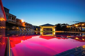 Outdoor pool, open 7:00 AM to 10:00 PM, pool umbrellas, pool loungers