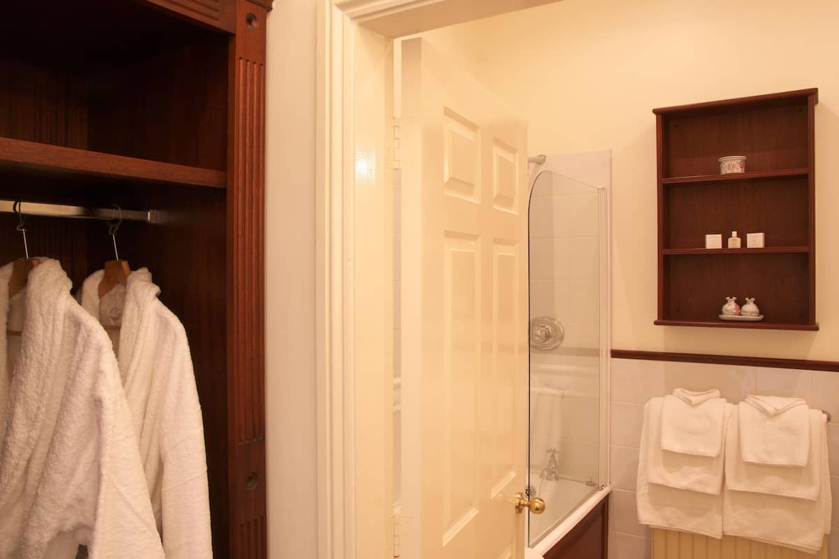 combined shower/bathtub, free toiletries, hair dryer, bathrobes