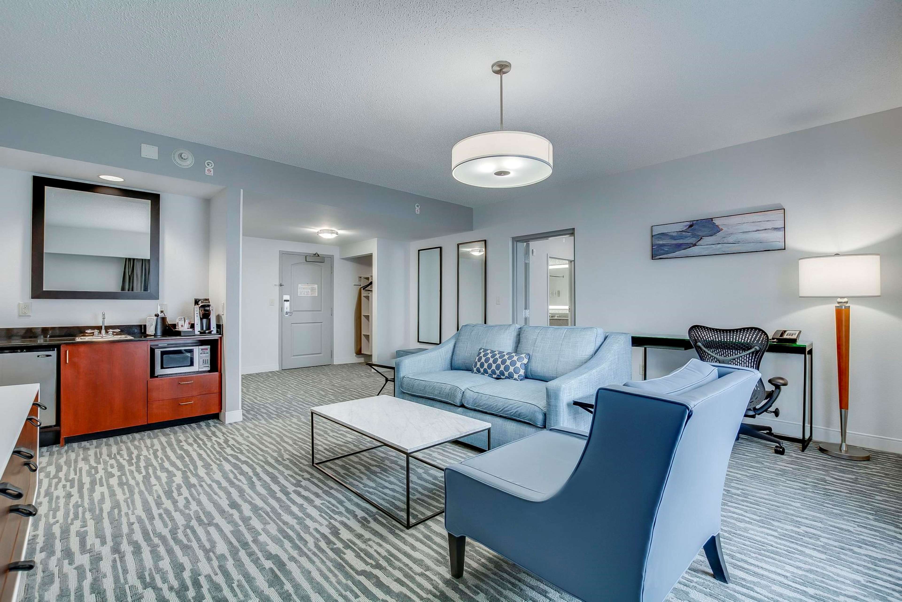 executive suite, 1 king bed | premium bedding, desk, laptop workspace, iron/ironing board