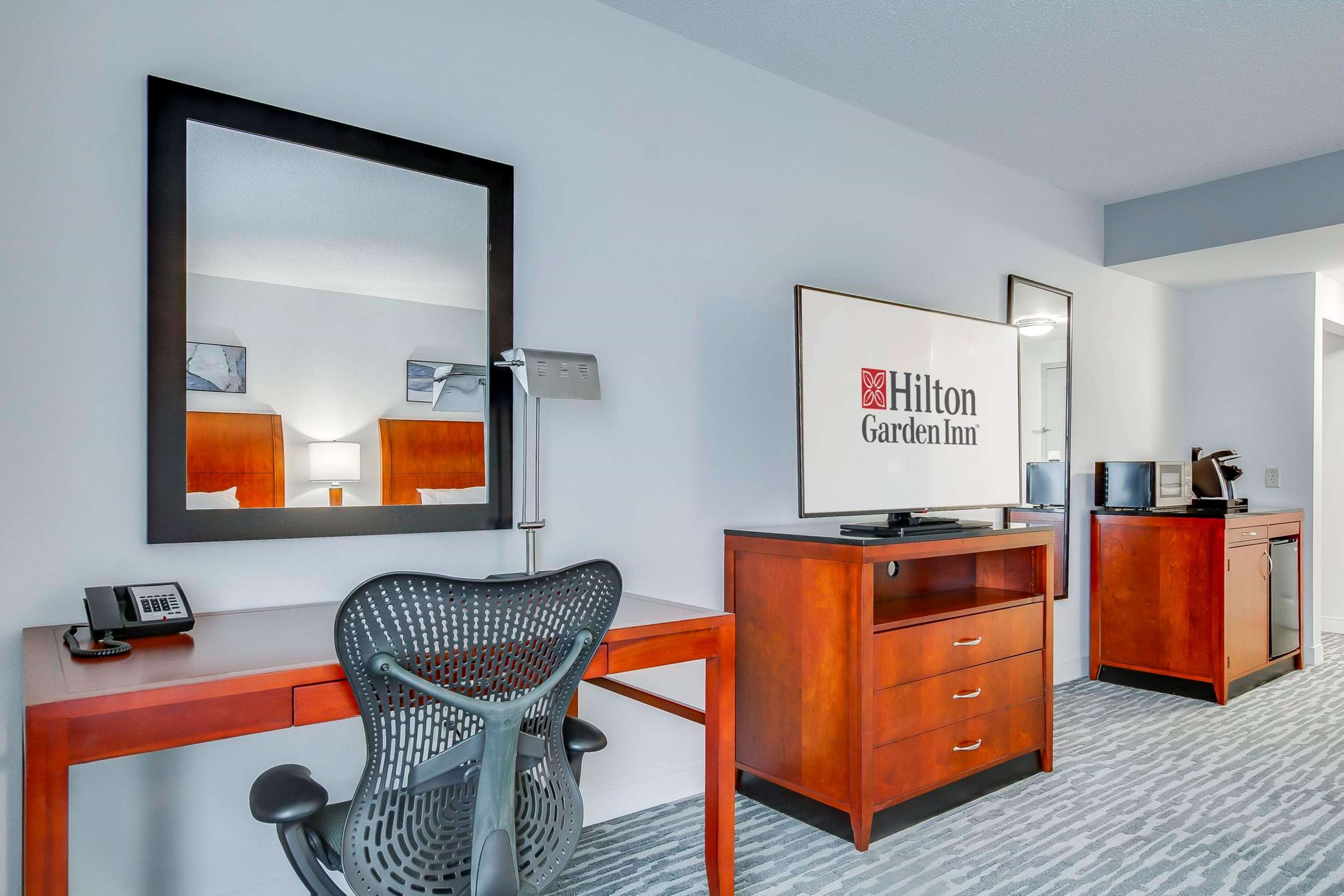 premium bedding, desk, laptop workspace, iron/ironing board