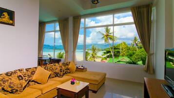 Presidential Suite, Private Pool | Living room | 21-inch flat-screen TV with satellite channels, TV, fireplace
