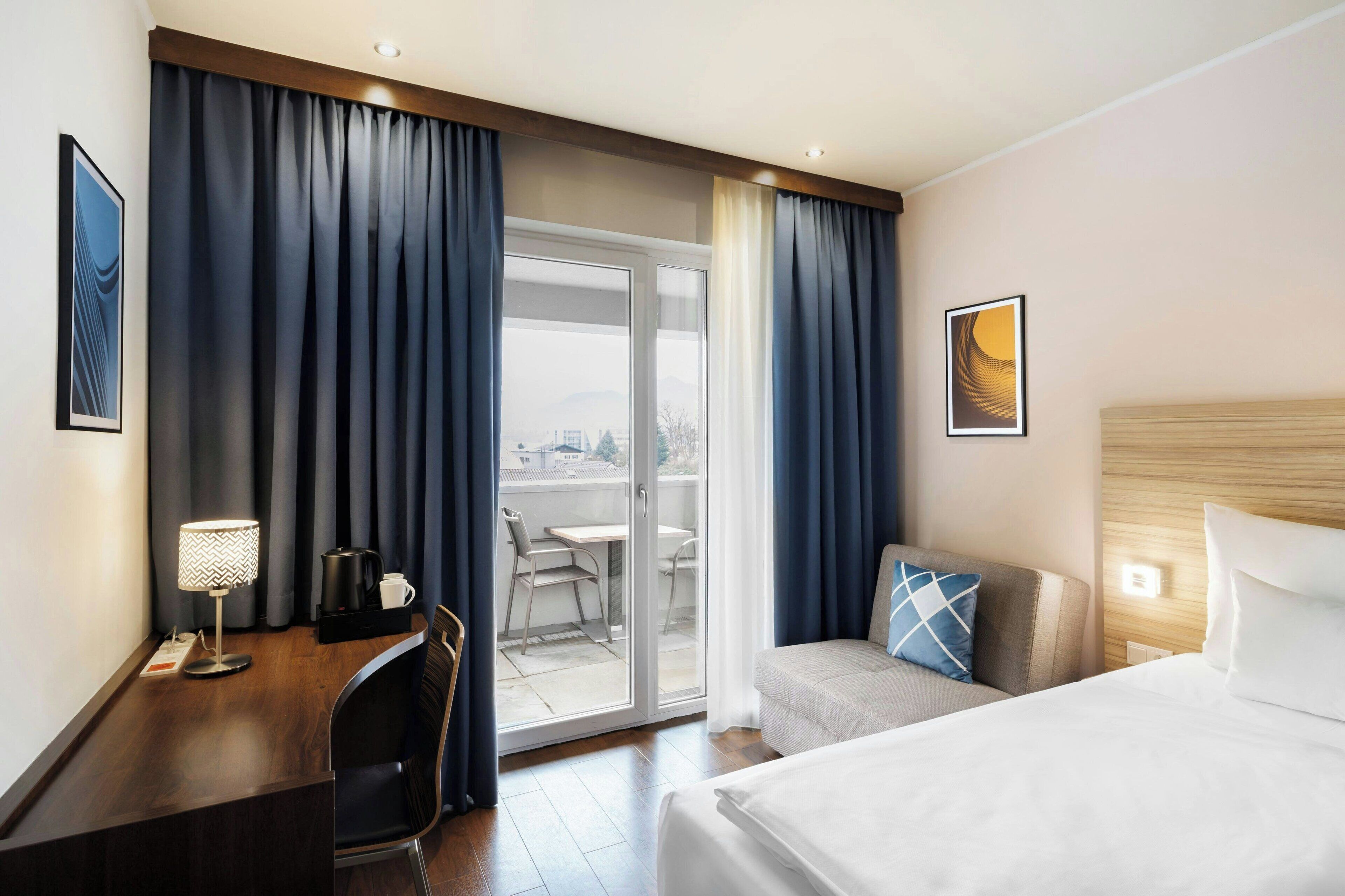 Standard Room, 2 Twin Beds, Balcony, City View (City View) | Minibar, in-room safe, desk, blackout drapes