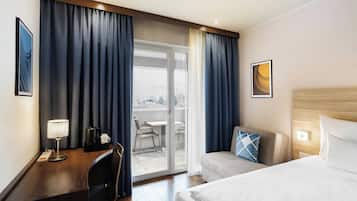 Standard Room, 2 Twin Beds, Balcony, City View (City View) | Minibar, in-room safe, desk, blackout drapes