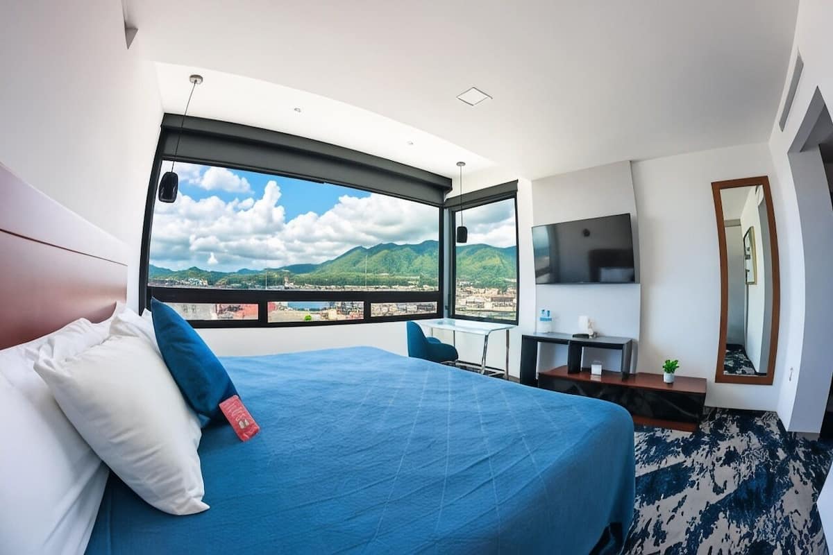 Premium bedding, down comforters, pillowtop beds, in-room safe