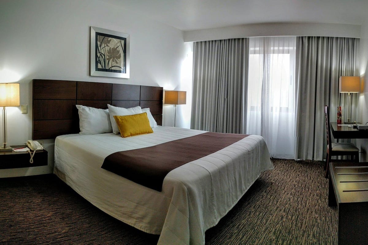 Premium bedding, down comforters, pillowtop beds, in-room safe