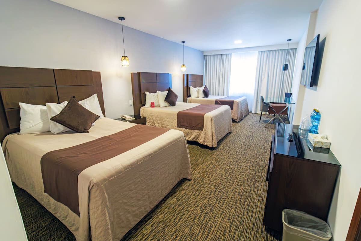 Standard Room, Multiple Beds | Premium bedding, down comforters, pillowtop beds, in-room safe