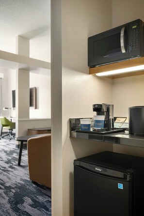 Premium bedding, desk, laptop workspace, iron/ironing board