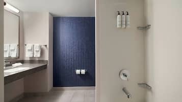 Combined shower/tub, designer toiletries, hair dryer, towels